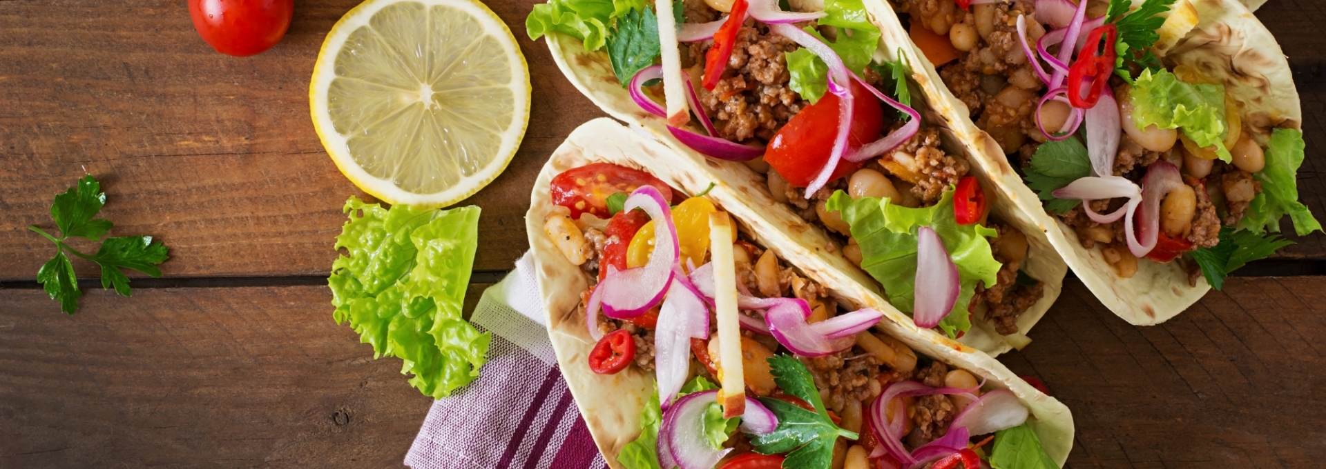 Mexican tacos with meat, beans and salsa. Top view Mexican tacos with meat, beans and salsa. Top view
