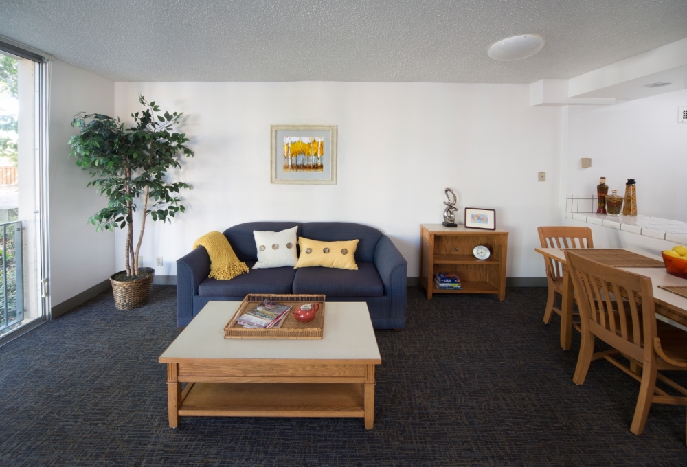 Escondido Village Midrise - One-Bedroom, One-Bath Apartments - available for couples without children (except McFarland) Living Room Escondido Village Midrise - One-Bedroom, One-Bath Apartments - available for couples without children (except McFarland) Living Room