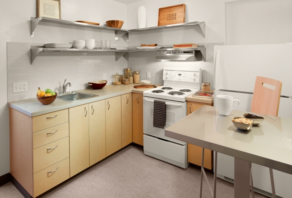 Escondido Village Midrise - One-Bedroom, One-Bath Compact McFarland Mid-rise Apartments - available for couples without children Kitchen Escondido Village Midrise - One-Bedroom, One-Bath Compact McFarland Mid-rise Apartments - available for couples without children Kitchen