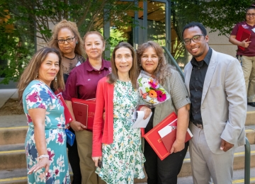 rogram Director Christine Gabali, shown here with students and instructor Gabriel Akin-Deko rogram Director Christine Gabali, shown here with students and instructor Gabriel Akin-Deko